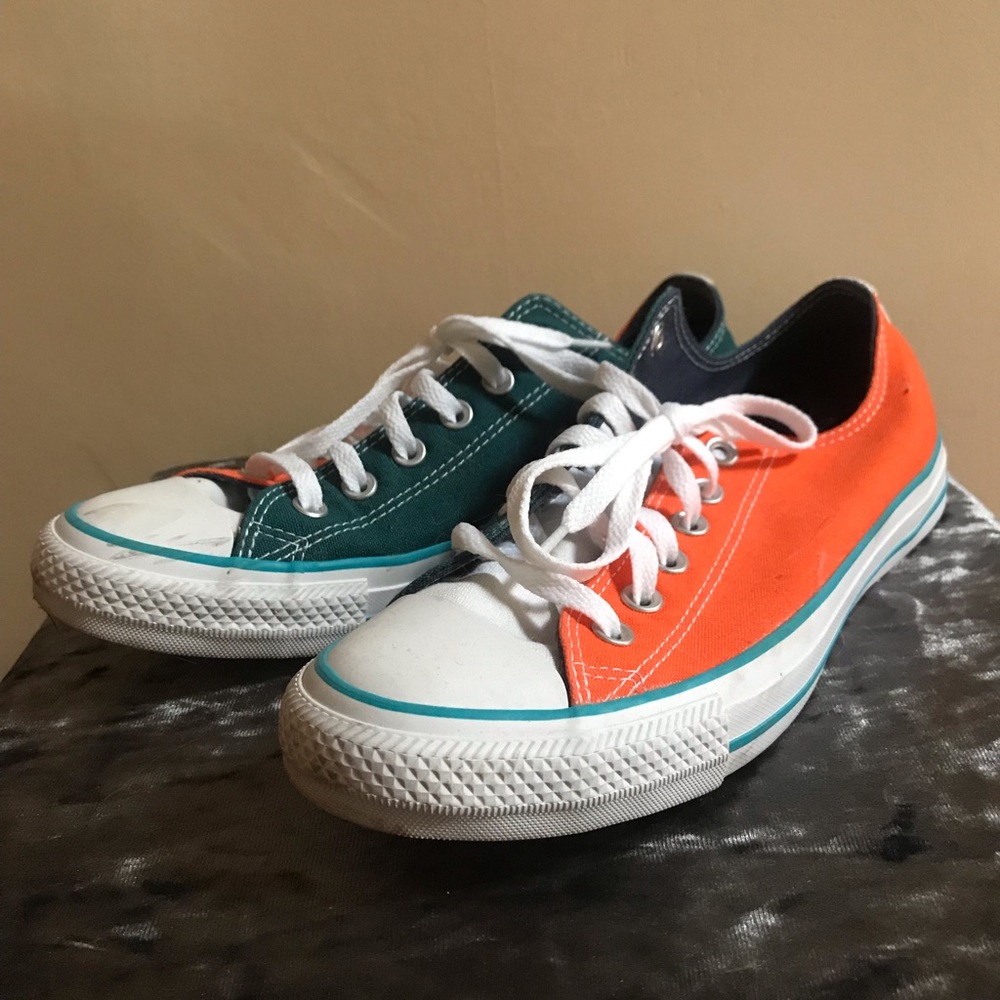 Two tone orange and teal converse sneakers